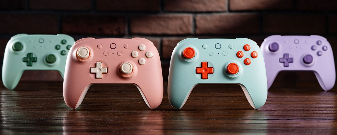 8BitDo Ultimate 2C wireless controller with hall-effect thumbsticks on a desk